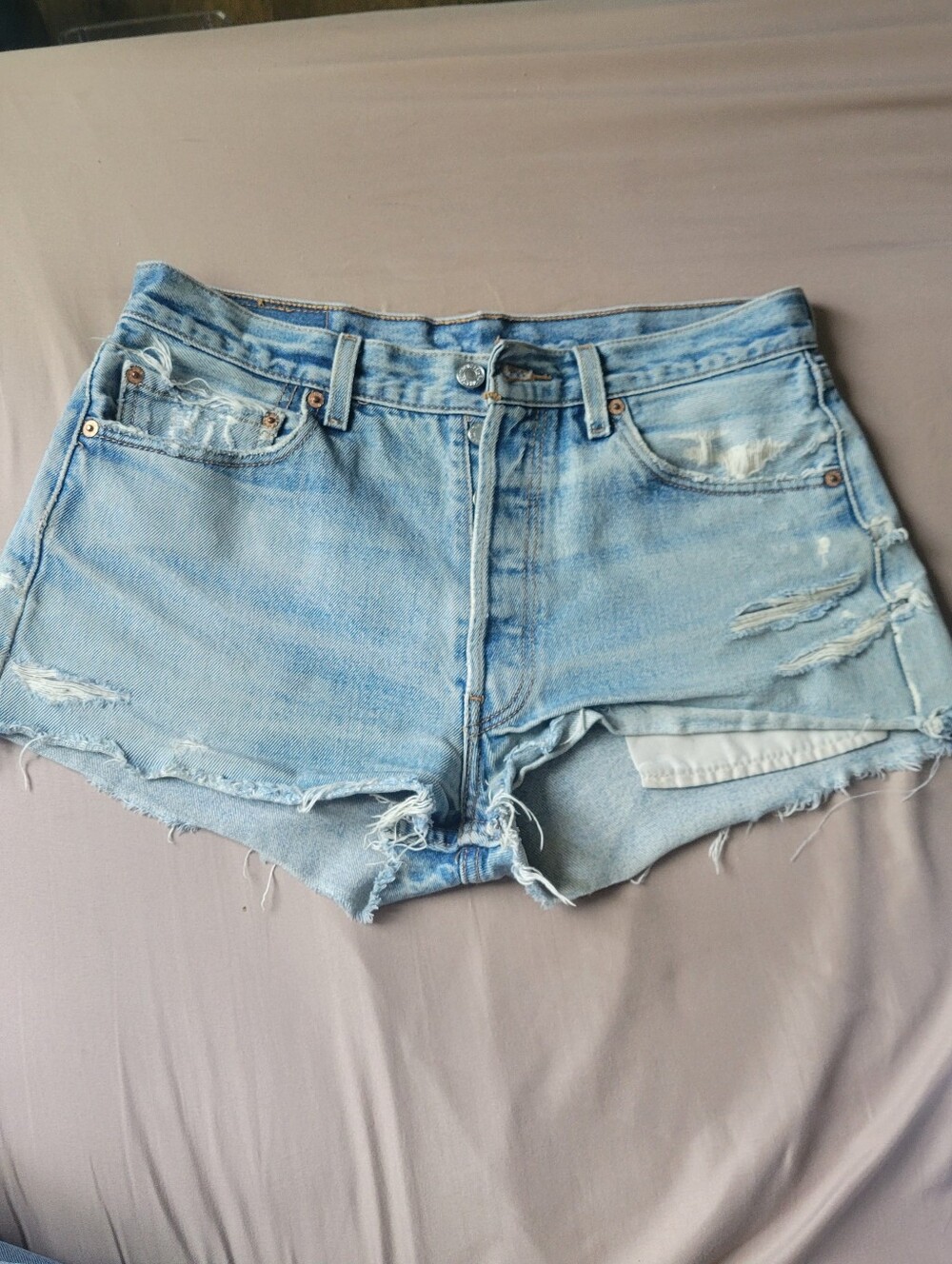 Vintage Levi's 501  Light Blue Distressed Denim Shorts